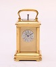 A lovely small Swiss gilt brass repeating carriage timepiece, circa 1860